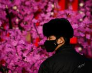 2017年1月3日，北京，一名戴著口罩的安保人員。攝影：Thomas Peter